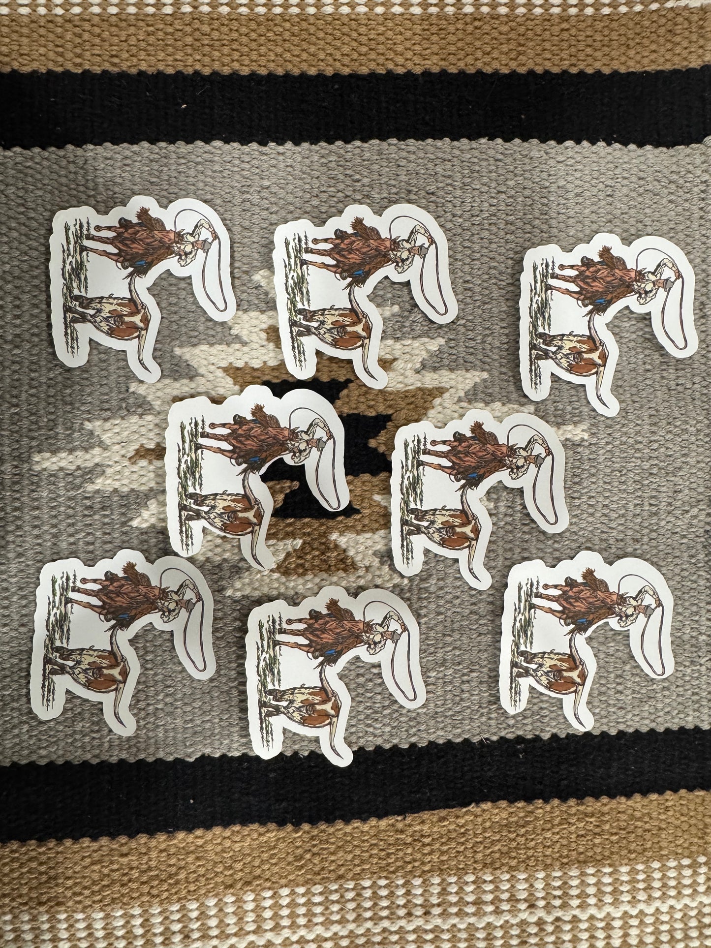 Cowboy roping a longhorn sticker